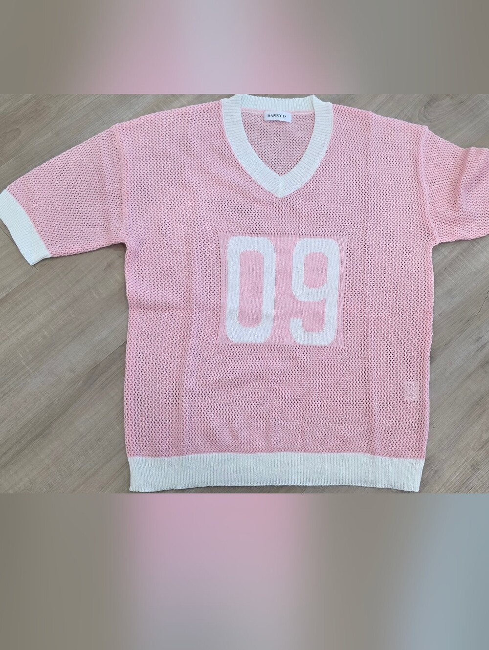 Pink Mesh Knit Sweater with White Trim and '09' Front